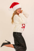 COQUETTE BOW CHRISTMAS SWEATER
