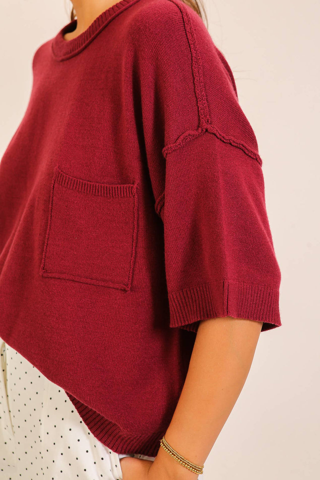 SHORT SLEEVE POCKET KNIT SWEATER