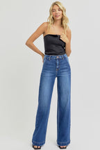RISEN HIGH RISE WIDE LEG SLANTED POCKET JEANS