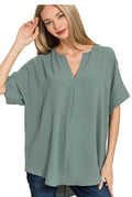 WOVEN AIRFLOW SPLIT NECK SHORT SLEEVE TOP