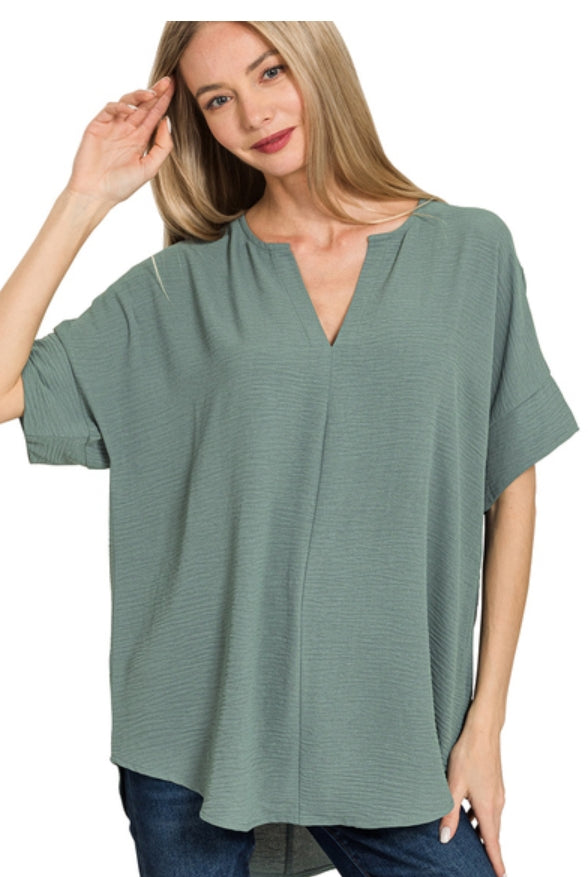 WOVEN AIRFLOW SPLIT NECK SHORT SLEEVE TOP